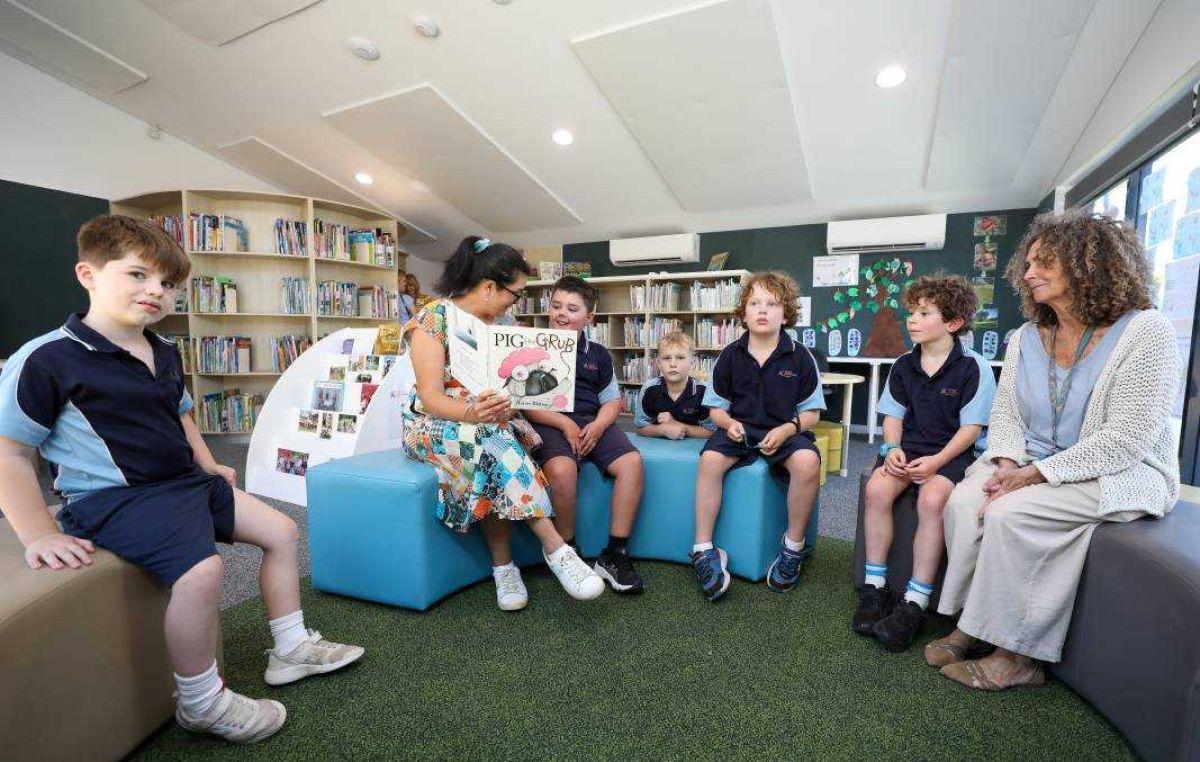 Students learning in the new school library